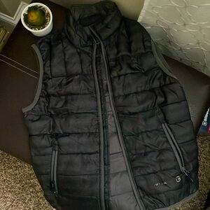 Boys used puffer vest in good condition.  See pictures for details.